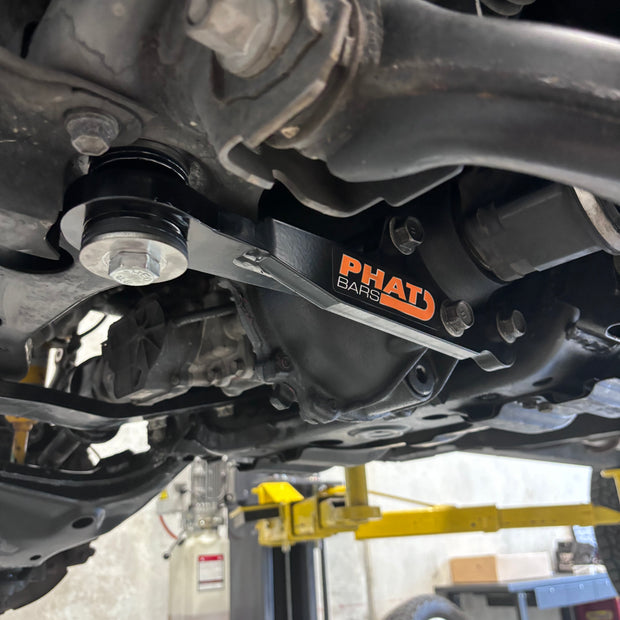 Toyota Hilux N70/80 PHAT Bars Diff Drop by Vehicle Modifications Network, showing the black diff drop installed on the vehicle's suspension.